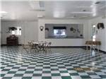 View larger image of Inside of the rec hall at ALMOND TREE RV PARK image #3