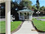 View larger image of A walkway leading to a gazebo at ALMOND TREE RV PARK image #4