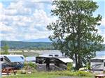View larger image of RV sites next to the water at APPLE ISLAND RESORT image #2