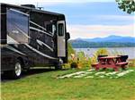 View larger image of A motorhome overlooking the water at APPLE ISLAND RESORT image #9