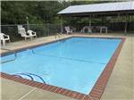 View larger image of The swimming pool area at COUNTRY SIDE RV PARK image #3