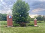 The front entrance sign of the University nearby at COZY C RV CAMPGROUND - thumbnail