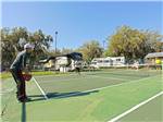 View larger image of People playing tennis at TOBYS RV RESORT image #6