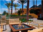 View larger image of Lounge furniture surrounding fire pit at GOLD CANYON RV  GOLF RESORT image #2