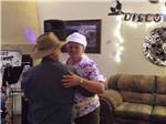 A couple dancing to music at PATO BLANCO LAKES RV RESORT - thumbnail