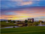 View larger image of The golf course with the casino in the background at WILDHORSE RESORT  CASINO RV PARK image #1
