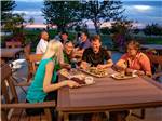 A group of people eating at a table at WILDHORSE RESORT & CASINO RV PARK - thumbnail
