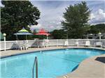 Community pool at campground clubhouse at KING'S HOLLY HAVEN RV PARK - thumbnail