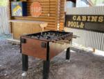 An foosball table under a covered outdoor area at THE NUGGET RV RESORT - thumbnail