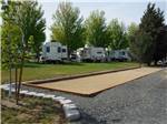 View larger image of Gaming sandpit in front of RV units at PILOT RV PARK image #3