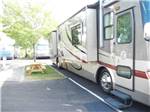 View larger image of Class A motorhome at site with picnic table at GOLD DUST WEST CASINO  RV PARK image #9