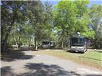 A row of paved RV sites at COUNTRY OAKS RV PARK & CAMPGROUND - thumbnail