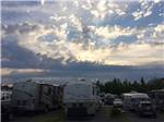 View of RVs parked onsite at dawn at BELLINGHAM RV PARK - thumbnail