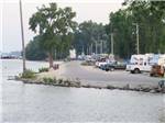 Vehicles parked near the riverfront at CITY OF CANTON MISSISSIPPI PARK - thumbnail