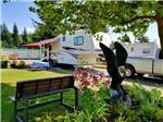 View larger image of Fifth wheel parked near eagle statue and bench at ELMA RV PARK image #4