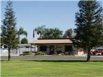 View larger image of Flag pole at lodge at A COUNTRY RV PARK image #2