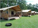 A row of safari tent rentals at SUN OUTDOORS CHESAPEAKE BAY - thumbnail