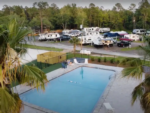Aerial view of swimming pool at Pelican Palms RV Park - thumbnail
