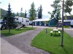 View larger image of A pull thru site with a picnic table at PAIR-A-DICE RV PARK image #3