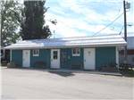 Blue campground office at PAIR-A-DICE RV PARK - thumbnail