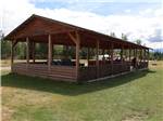 Picnic area with wooden canopy at IRVIN'S PARK & CAMPGROUND - thumbnail