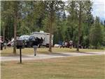 Campsite with truck and trailer at IRVIN'S PARK & CAMPGROUND - thumbnail