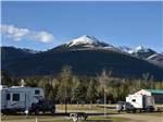 Travel trailers parked in RV sites at IRVIN'S PARK & CAMPGROUND - thumbnail