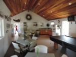 Interior of the Rec room with seating and billiards at RISING RIVER RV RESORT & RIVER HOUSE - thumbnail