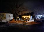 Lit trailer at night at Rancho Verde RV Park - thumbnail