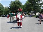 Santa standing in the middle of the street at SUGAR RIDGE RV VILLAGE & CAMPGROUND - thumbnail