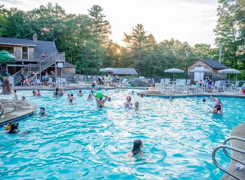 People playing in the large pool