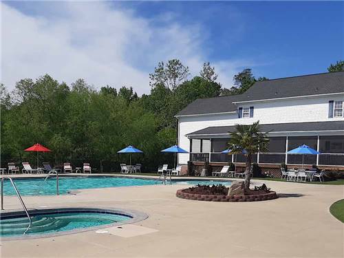 The hot tub and swimming pool at RALEIGH OAKS RV RESORT & COTTAGES
