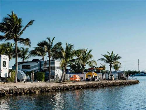 Trailers and tents up against the water at BOYD'S KEY WEST CAMPGROUND