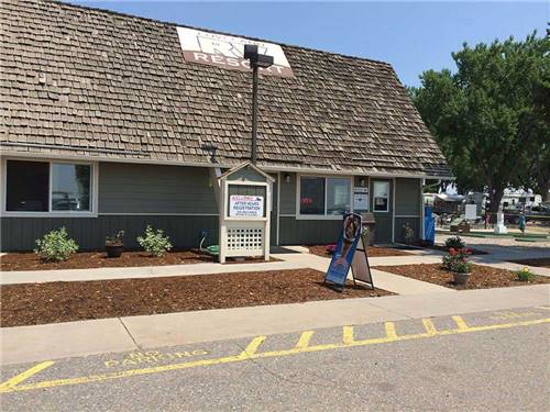 Gray lodge office at LOVELAND RV RESORT