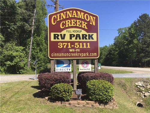 The front entrance sign at CINNAMON CREEK RV PARK