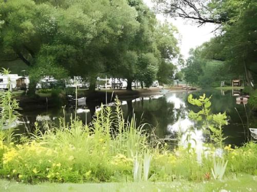 Pond surrounded by campsites