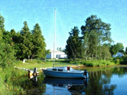 Boat in lake at site No-Nah-Ma Resort