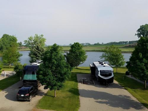 Parked RV and trailer at Crystal Springs RV Resort