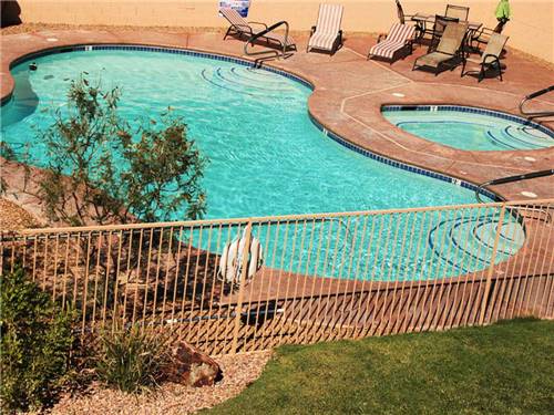 Swimming pool with hot tub at DUCK CREEK RV PARK
