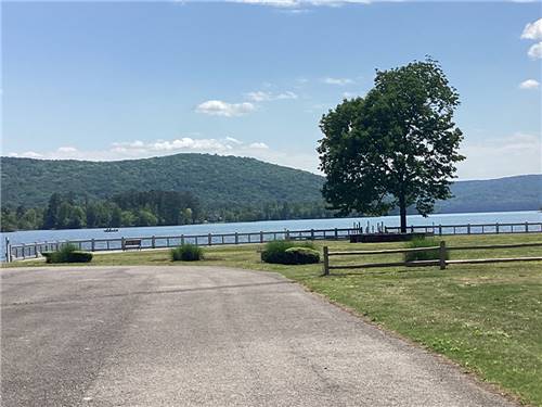 View of the lake with docks and boathouses at WINDEMERE COVE RV RESORT