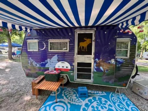 Travel trailer with moose mural at Ozark Outdoors/Riverfront Resort
