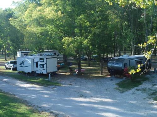 Trailers parked at site Ozark Outdoors/Riverfront Resort