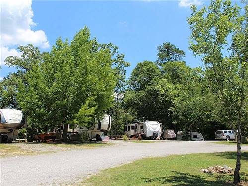 Trailers at campsite at THOUSAND TRAILS HIDDEN COVE