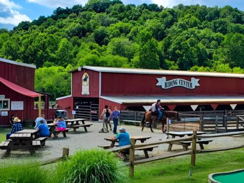 Horses and people at rec center at Rocky Fork Ranch Resort
