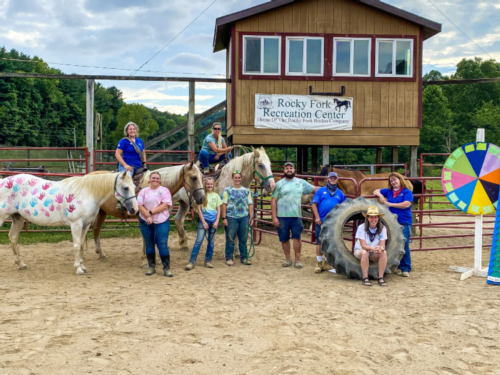 Horses and people at rec center at Rocky Fork Ranch Resort