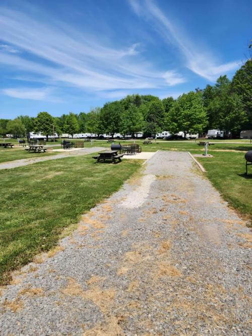 Open RV space with panic area at site Andover/Pymatuning Lake KOA