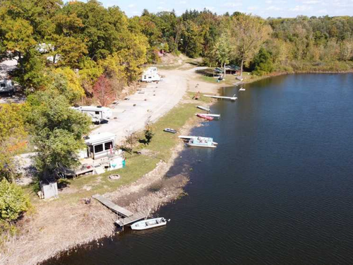 Boats docked on a lake