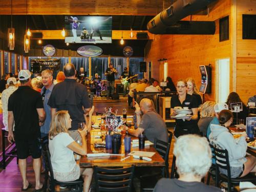 People enjoying the band at the bar and grill