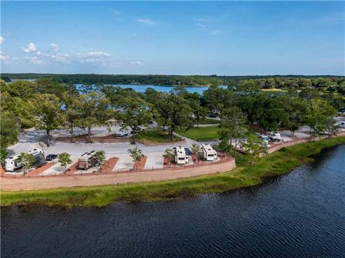 An aerial view of the RV sites by the water at TWIN LAKES CAMP RESORT