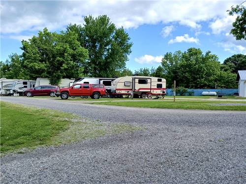 A gravel road that leads to RV sites